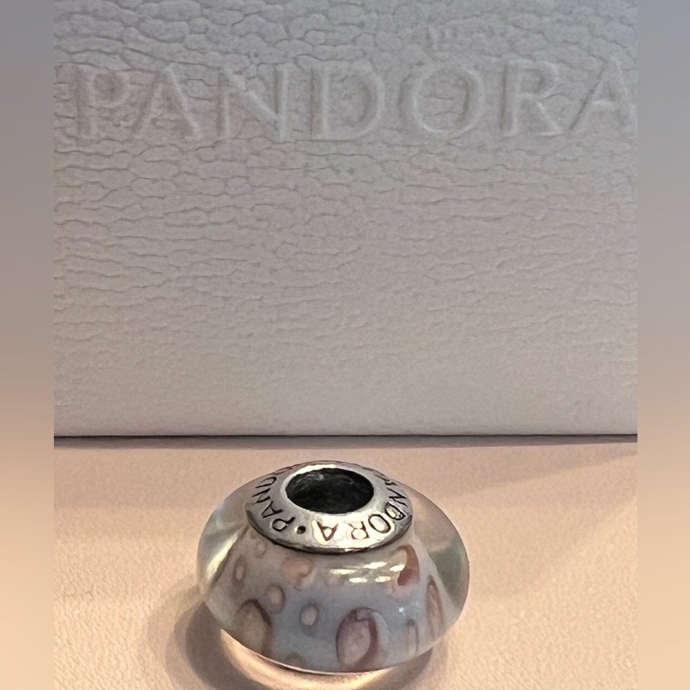 Authentic Pandora S925 Milano glass bead charm.